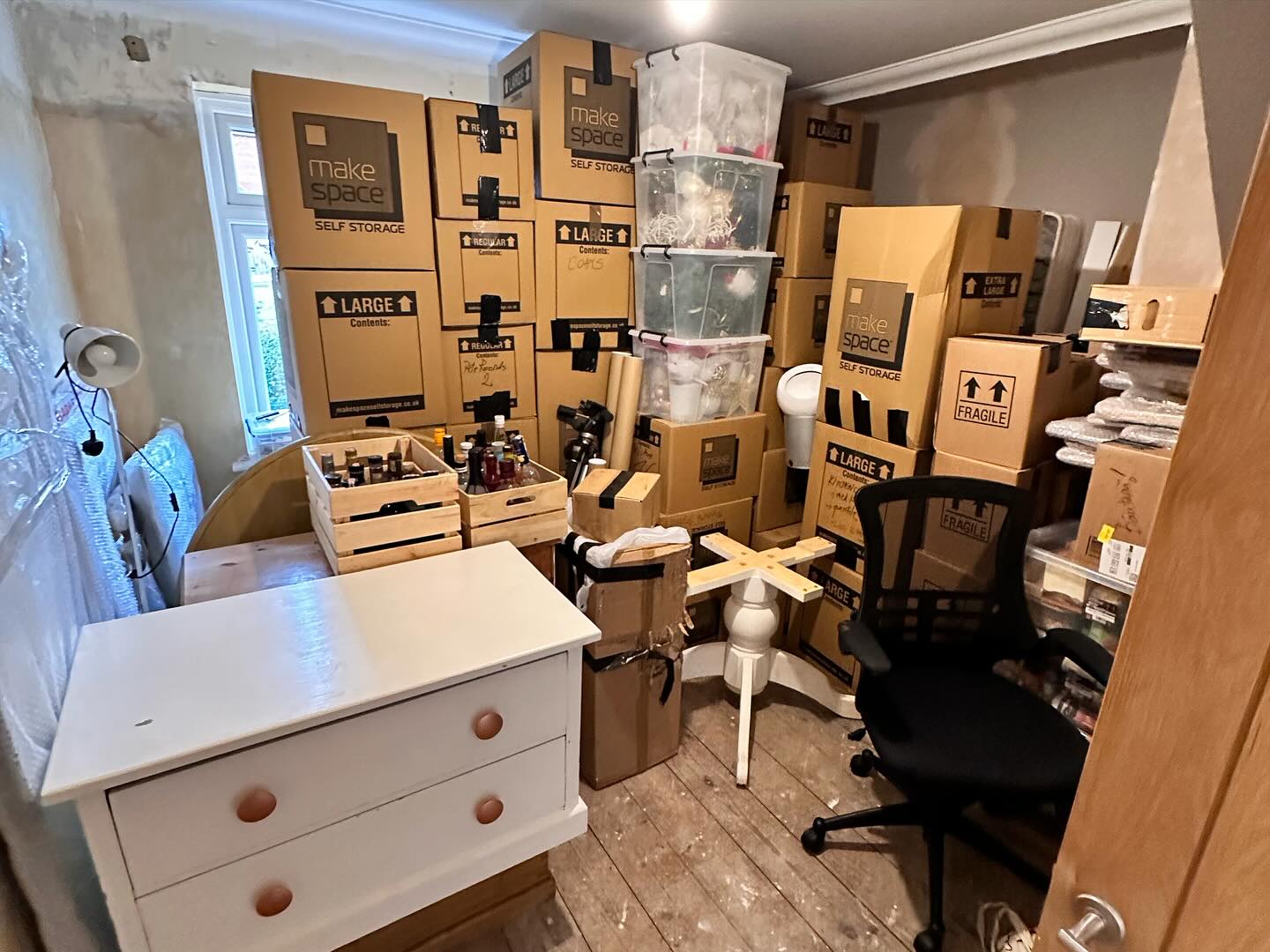 Boxes packed up in home bedroom